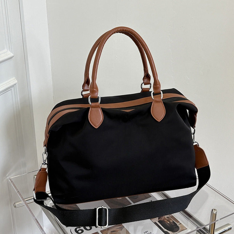 #139.85 Women's new portable outdoor commuter handbag fitness bag